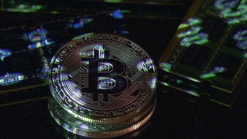 Bitcoin cryptocurrency BTC and computer components Stock-Footage 77508298