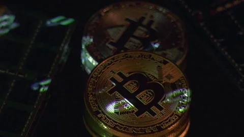Bitcoin cryptocurrency BTC and computer components Video stock 77508320