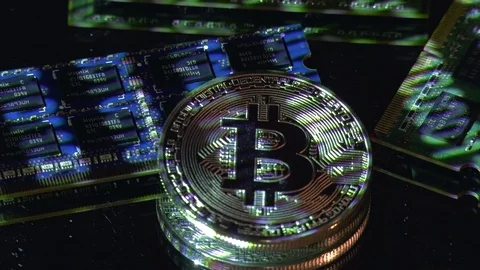 Bitcoin cryptocurrency BTC and computer components Stock-Footage 77545484