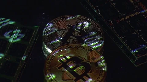 Bitcoin cryptocurrency BTC and computer components Stock-Footage 77545492
