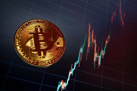 Bitcoin cryptocurrency coin on the background of the chart Stock Photos