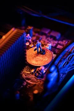 Bitcoin Cryptocurrency coin on a PC computer motherboard, crypto currency min Stock Photos