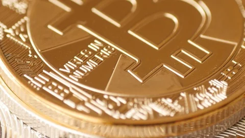 Bitcoin cryptocurrency coin rotating, macro Stock Footage 88424671
