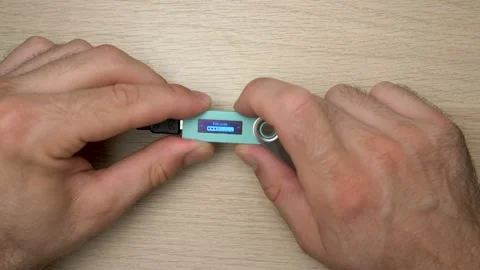 Bitcoin Cryptocurrency Hardware Wallet, man entering wrong pin code Stock Footage 156495507