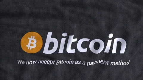 Bitcoin cryptocurrency as a payment method dark flag waving animation logo Stock Footage 80863003