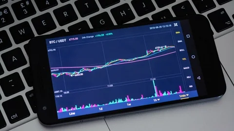Bitcoin cryptocurrency price chart on digital exchange on mobile phone screen on 库存影片 94142519