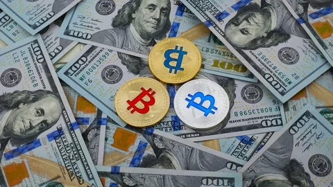 Bitcoin cryptocurrency rotating on the USD background Stock Footage 88225807