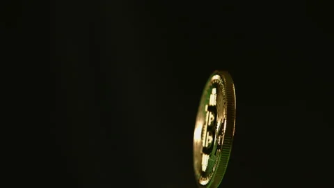 Bitcoin cryptocurrency spinning on black background pt 3 of 12 Stock Footage 149706602