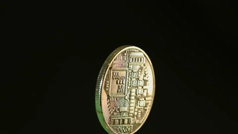 Bitcoin cryptocurrency spinning on black background pt 7 of 12 Stock Footage 149709854