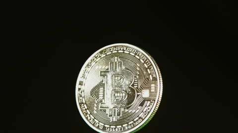 Bitcoin cryptocurrency spinning on black background pt 12 of 12 Stock Footage 149712534
