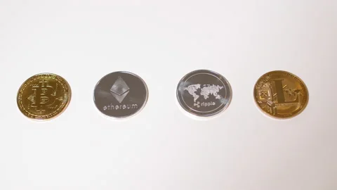 Bitcoin Cryptocurrency on table. Stock Footage 140986314