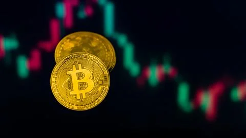 Bitcoin Cryptocurrency with Trading Chart Background 스톡 사진