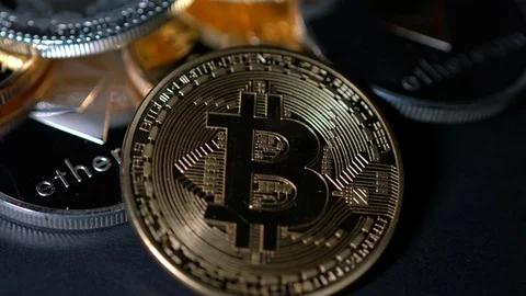 Bitcoin cryptocurrency under flashing light Stock Footage 111389044