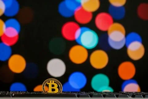 Bitcoin currency on keyboard computer on bokee background.Virtual cryptocurre Stock Photos
