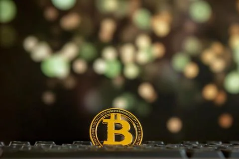Bitcoin currency on keyboard computer on bokee background.Virtual cryptocurre Foto stock