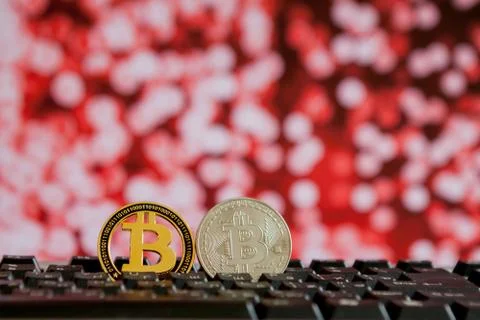 Bitcoin currency on keyboard computer on bokee background.Virtual cryptocurre Stock Photos