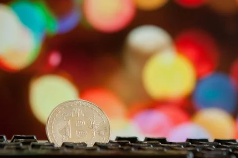 Bitcoin currency on keyboard computer on bokee background.Virtual cryptocurre Stock Photos