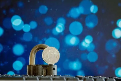 Bitcoin currency on keyboard computer on bokee background.Virtual cryptocurre Stock Photos