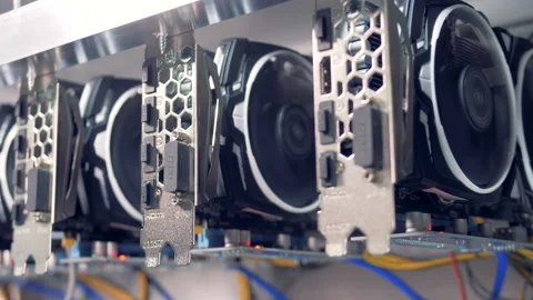 Bitcoin currency mining concept. Lots of bitcoin miners set up on shelfs. 4K. Video stock 102161096