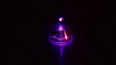 Bitcoin on a dark background is illuminated with a contrasting light and scanned Stock-Footage 168468535