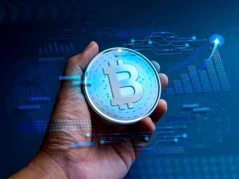 Bitcoin, digital assets in the hand with tech graphics, business growth graph 写真素材