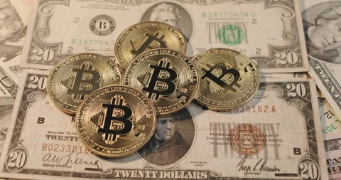 Bitcoin on Dollar banknotes. Blackmail with cryptocurrency concept Stock Footage 176664973
