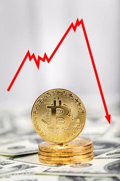 Bitcoin on dollar banknotes with decrease price graphic diagram Stock Photos