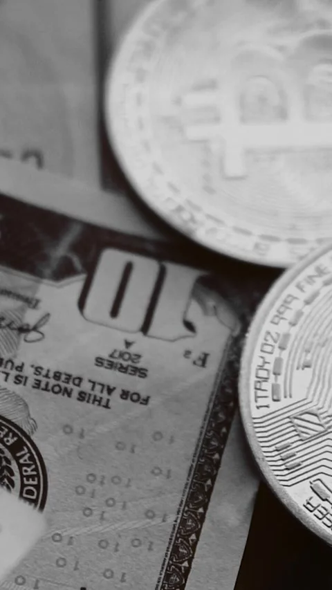 Bitcoin with dollars bills in wallet. Digital crypto coin. Investments, investor Видео 329624016