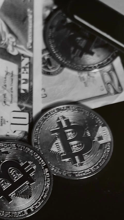 Bitcoin with dollars bills in wallet. Digital crypto coin. Investments, investor Stock Footage 329624029