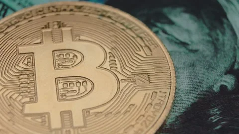 Bitcoin, dollars, cryptocurrencies close-up. World currency. Video stock 151110927