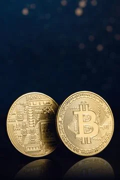 Bitcoin e-cryptocurrency on black background. Stock Photos