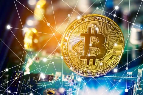 Bitcoin on electronic circuit board. Cryptography and Electronic money concep Stock-Fotos