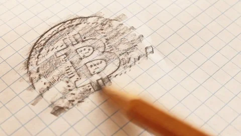 Bitcoin engraving on a notebook sheet with a pencil, hatching appears on the lin Stock Footage 101665951