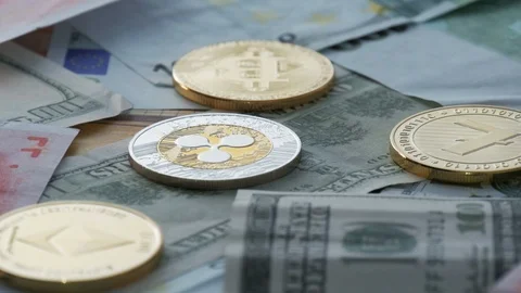 Bitcoin Ether Litecoin Ripple. Cryptocurrencys loopable rotation shot. Stock Footage 86432164