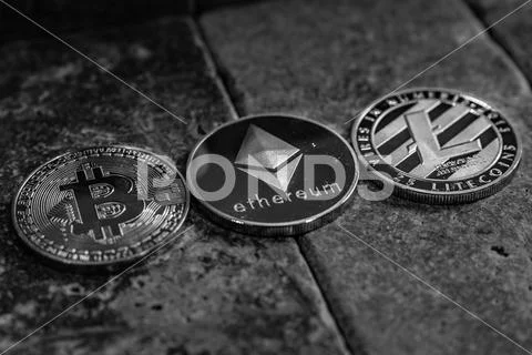 Bitcoin Ethereum and Litecoin Cryptocurrencies Stock Photos