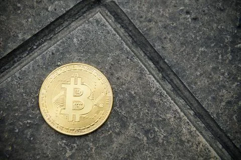 Bitcoin fall to the ground Stock Photos