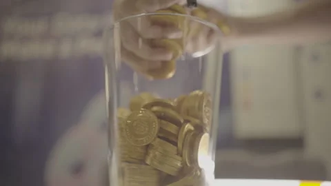 Bitcoin falling coins hand reaching Stock Footage 148150236
