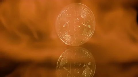 Bitcoin on fire slow motion flames - cryptocurrency on fire Stock Footage 143351638