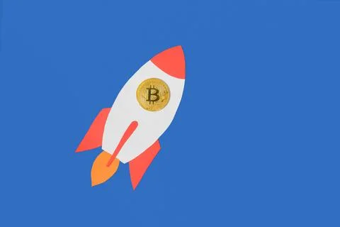 Bitcoin flying on paper rocket Stock Photos