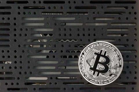 Bitcoin in front of computer board Stock Photos