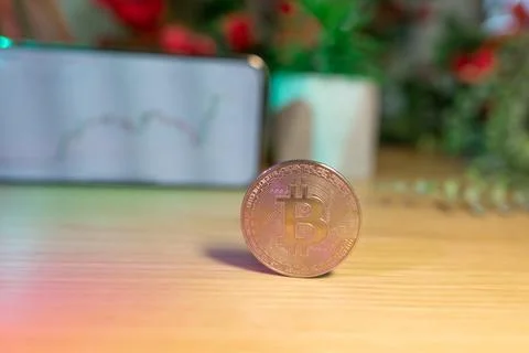 Bitcoin gold coin - crypto chart on a smartphone - cryptocurrency concept Stock Photos
