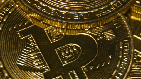 Bitcoin gold coin is spinning.virtual cryptocurrency. Macro shooting Stock Footage 120475766