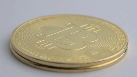 Bitcoin gold coins on white background close-up, cryptocurrency and blockchain Stock Footage 170853614