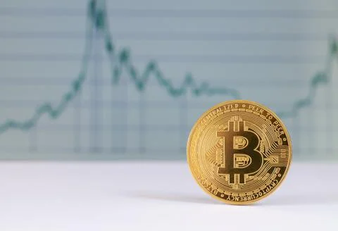 Bitcoin on graph chart background and virtual cryptocurrency concept Stock Photos