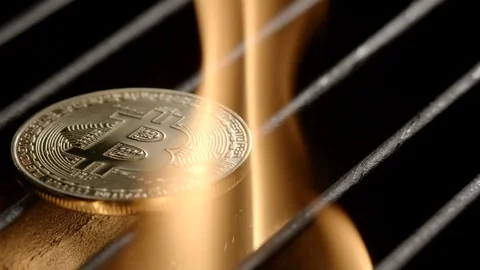 Bitcoin is grilled in a flame Stock Footage 88949364
