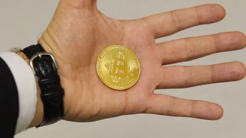 Bitcoin in hand Stock Footage 103841564