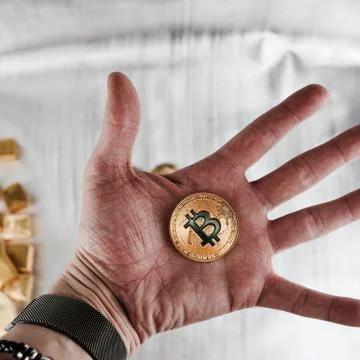 Bitcoin on the hand Stock Photos