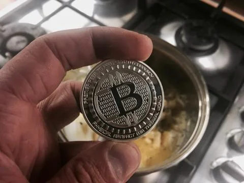 Bitcoin in hand Stock Photos