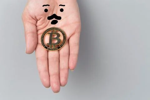 Bitcoin on the hand Stock Photos