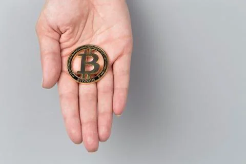Bitcoin on the hand Stock Photos